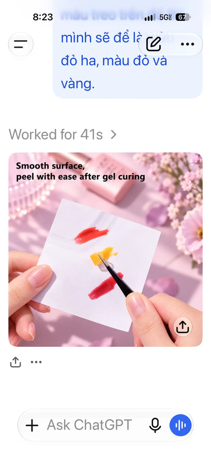Nail artist mixing gel colors on waterproof disposable palette paper