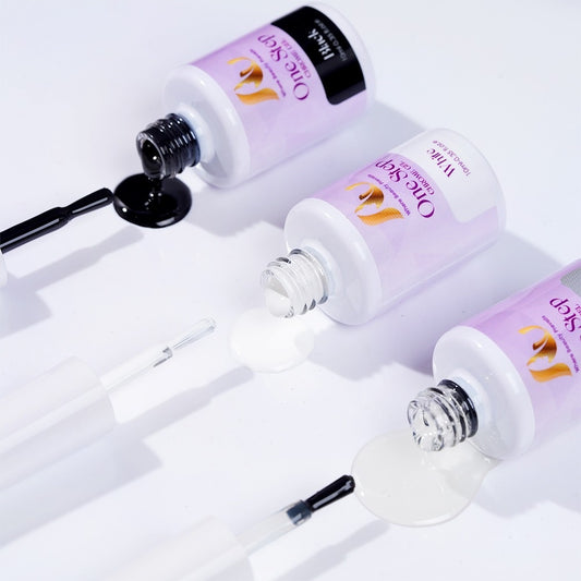 Nail care product set with bottles and a box on a white background